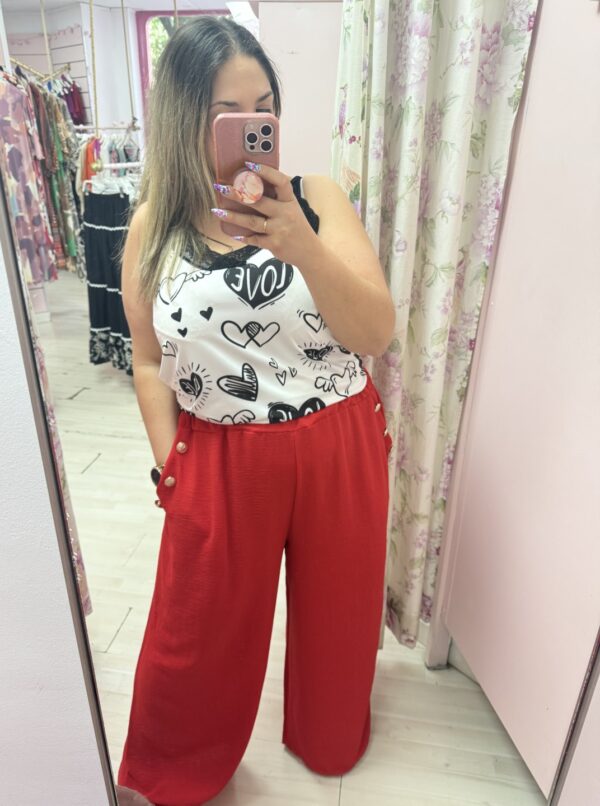 Pantalon tela botones ancho