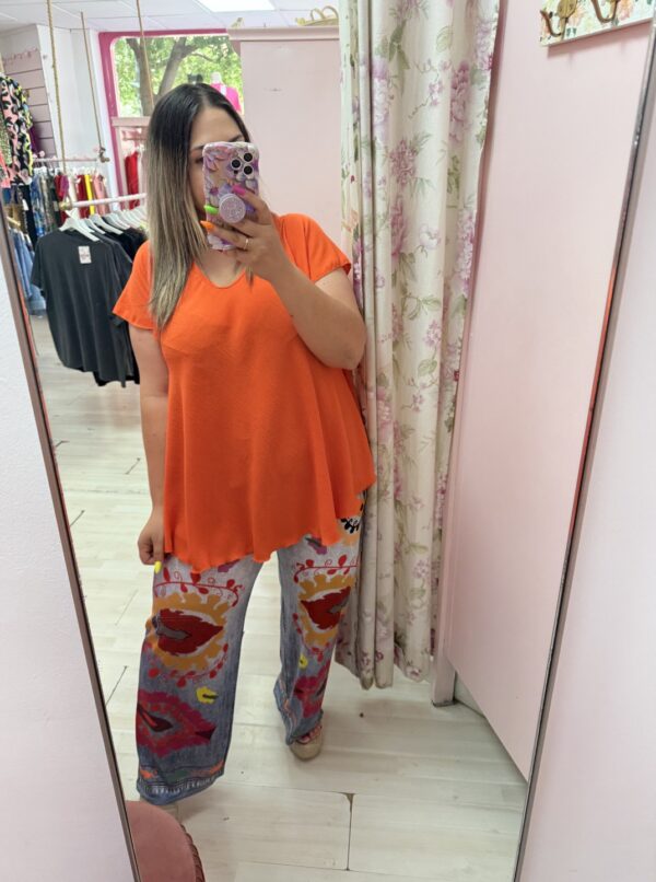 Camiseta vuelo naranja