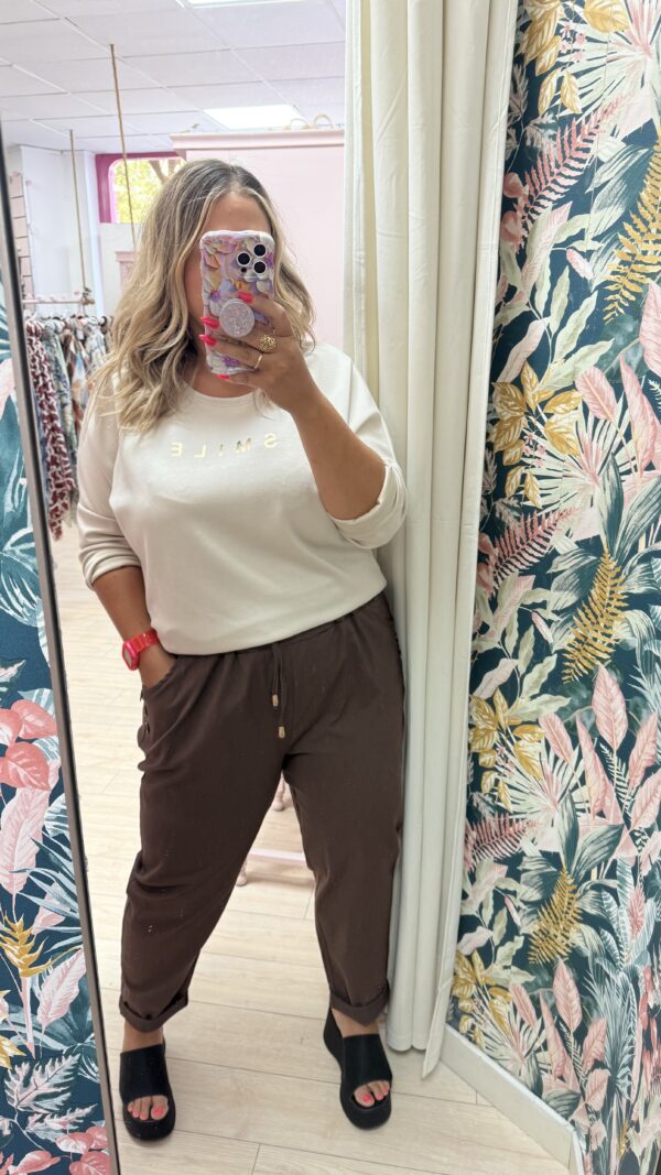 Pantalon elastico botones laterales