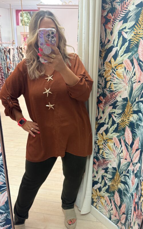 Blusa botones estrella teja