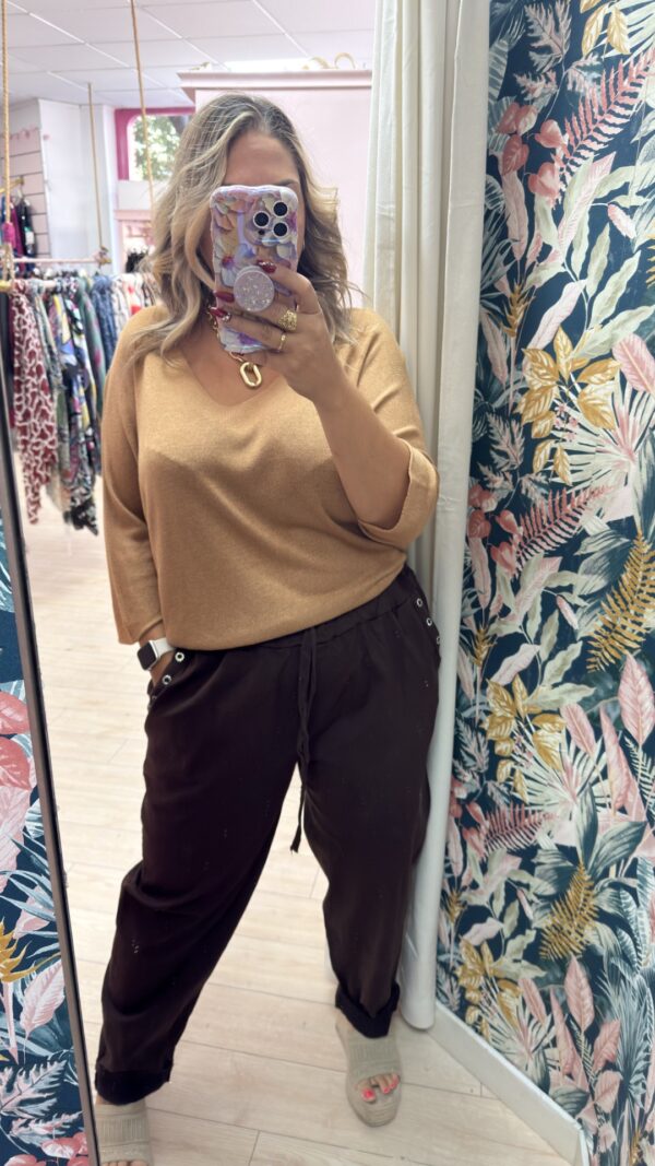 Pantalon tachas