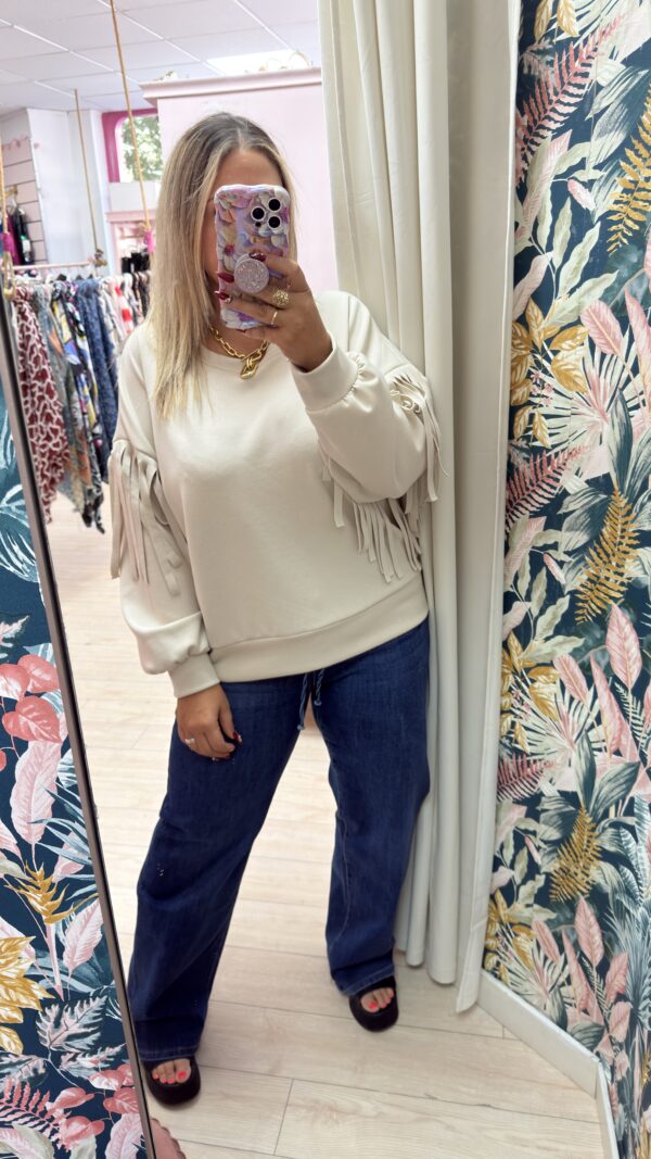 Sudadera flecos beige